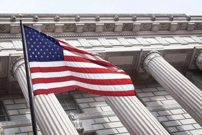 American flag outside of government building